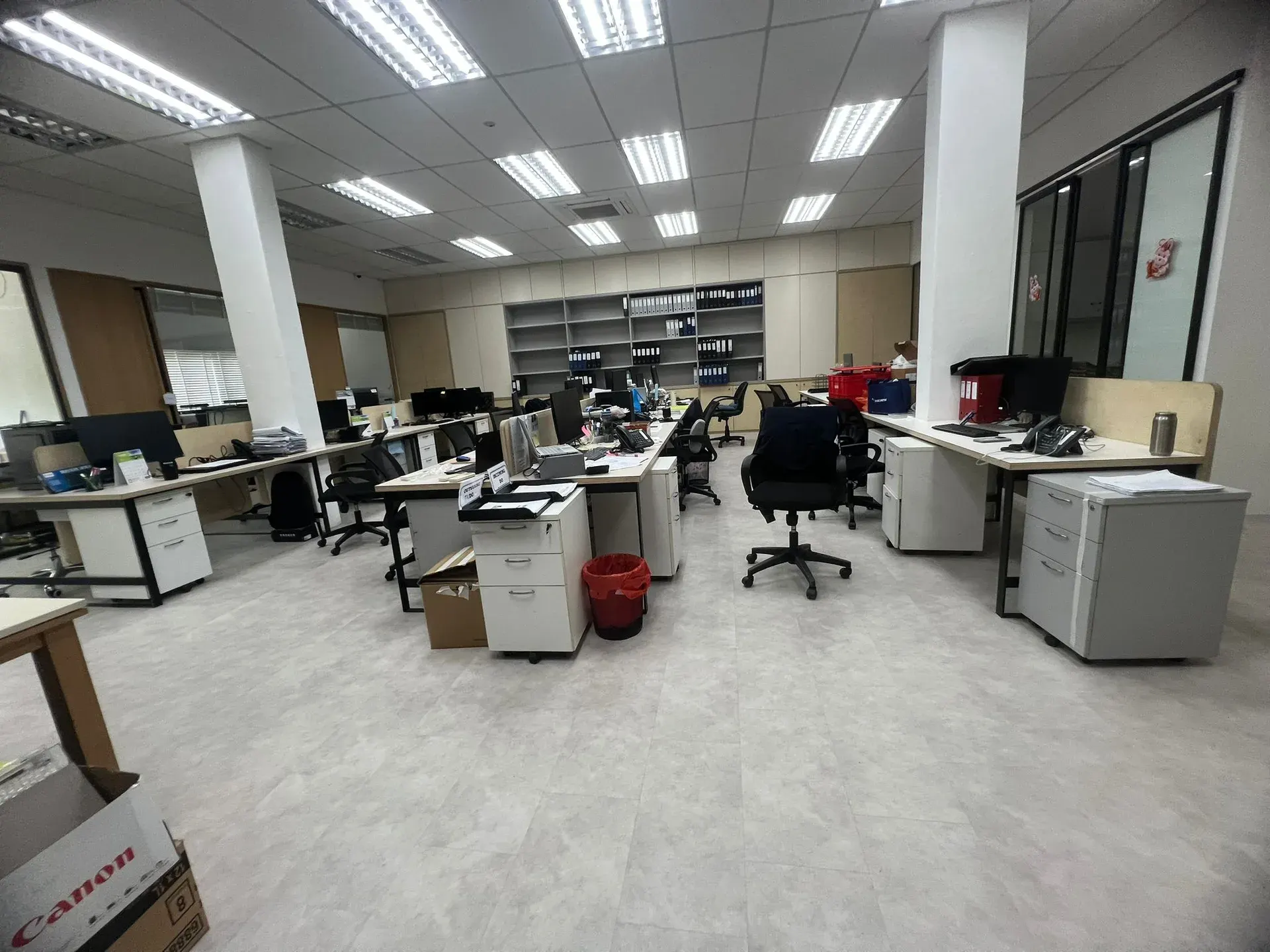 Commercial vinyl flooring laid across an open-plan Singapore office