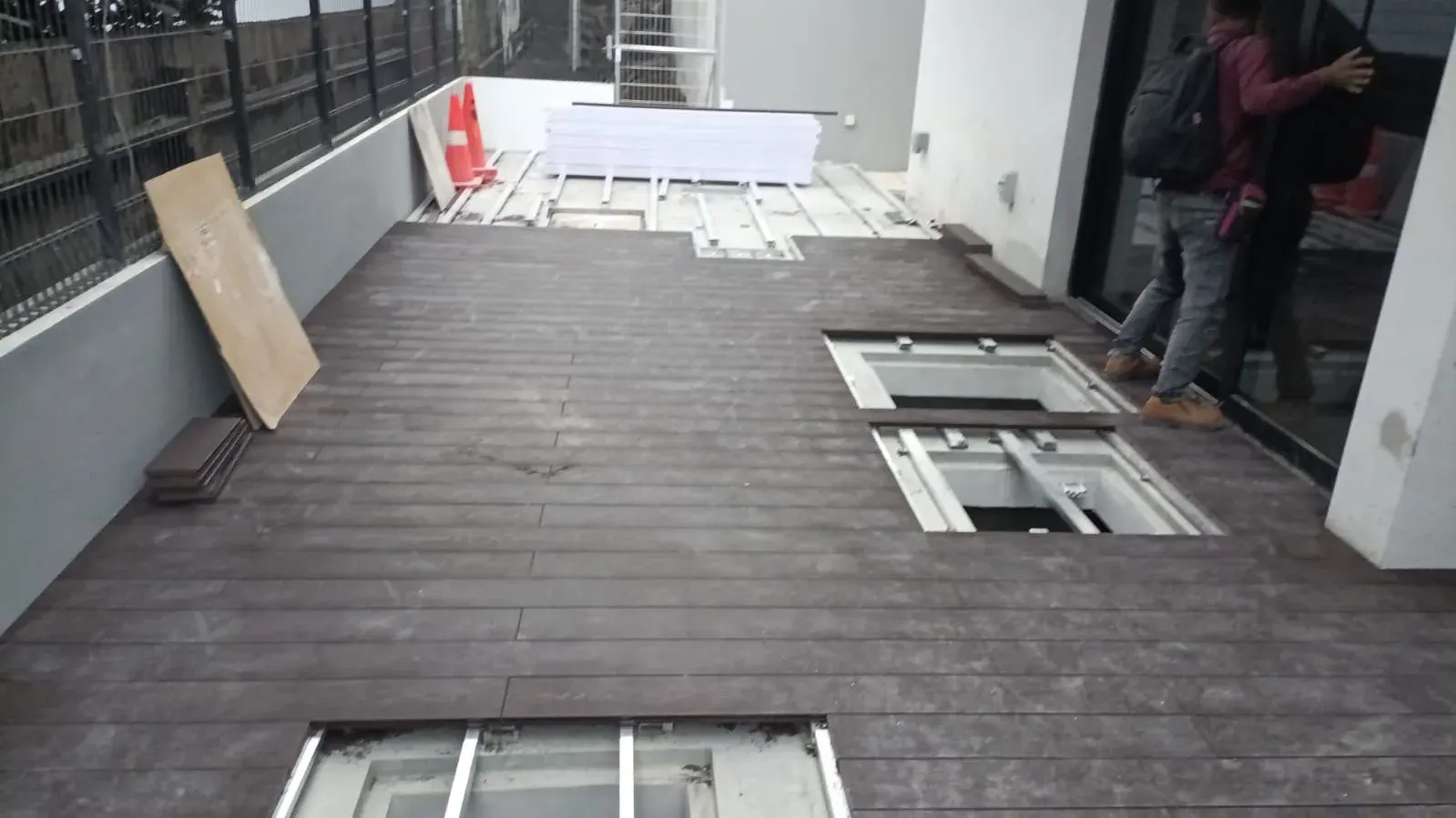 Composite timber decking laid across a rooftop terrace