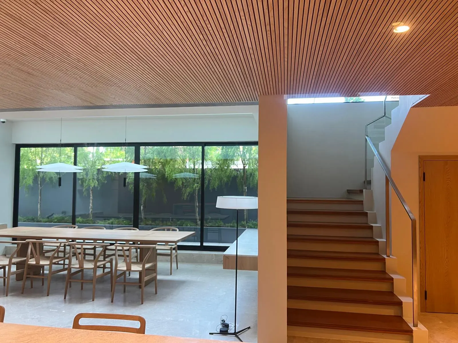 Wide-plank wooden flooring in a luxury living room