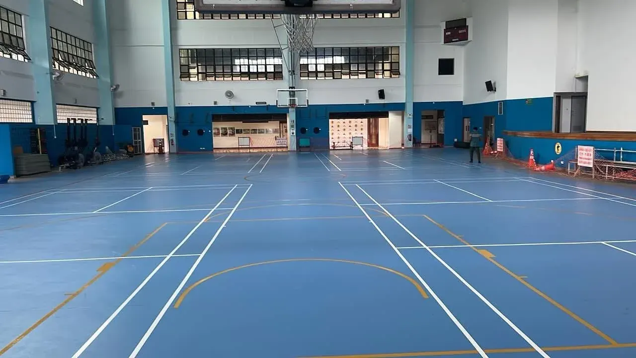 Completed indoor sports court floor with painted game lines