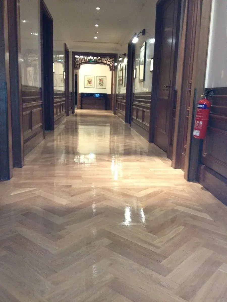 Herringbone parquet wooden flooring in a residential room